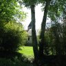 L'église Saint-Eloi de Fougères-sur-Bièvre (XIIe siècle) vue du jardin du château.